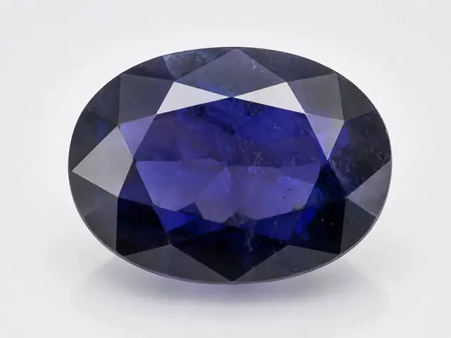Violet-blue Iolite (Neeli) gemstone for intuition and Saturn balance.