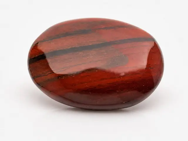 Earthy Red Jasper stone with natural grounding red tones.