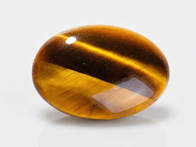 Golden-brown Tiger's Eye stone for bracelets, decor, and personal use.