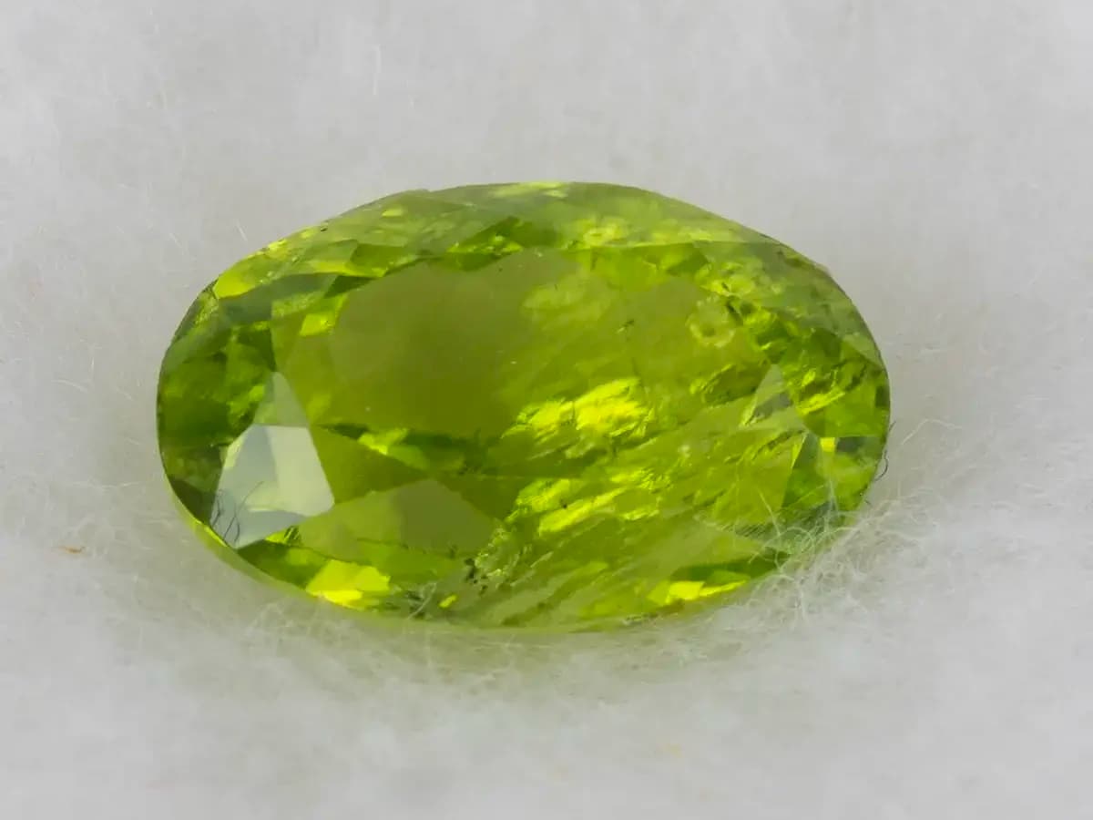 Natural Peridot Stone (Pakistan Sapat Valley) 3.57 Carat (3.92 Ratti) Oval Mix Cut - View #1