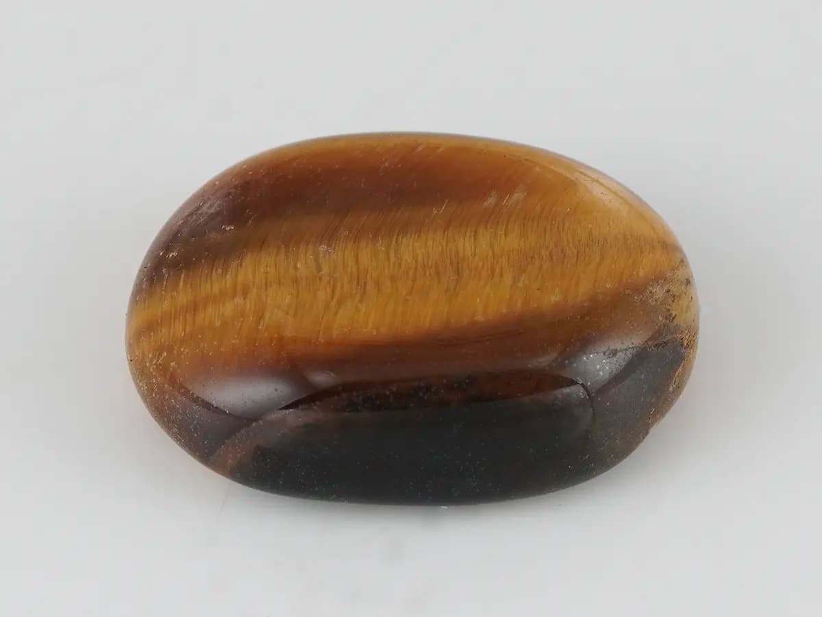 Natural South African Tiger Eye Stone 5.91 Carat (6.49 Ratti) Oval Cabochon - View #1