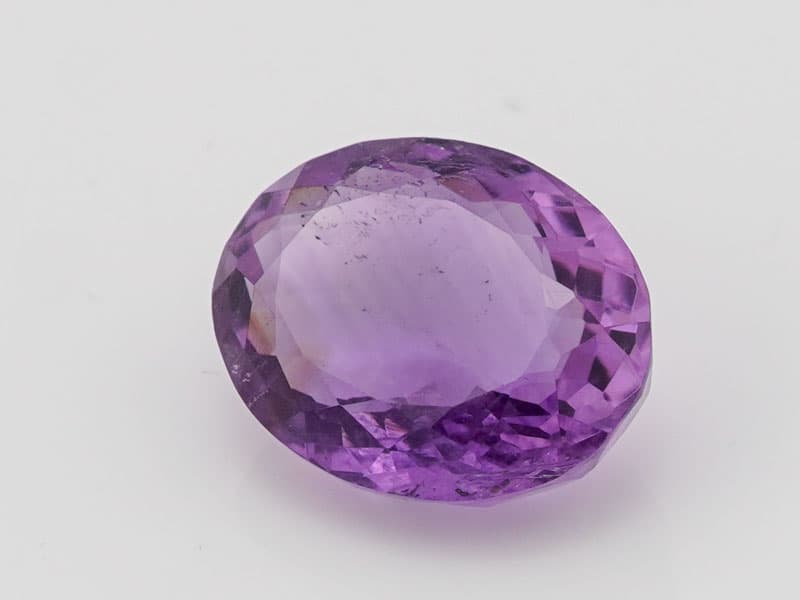 Certified Natural Amethyst Stone (Jamunia) 7.79 Carat (8.56 Ratti) Oval Shape