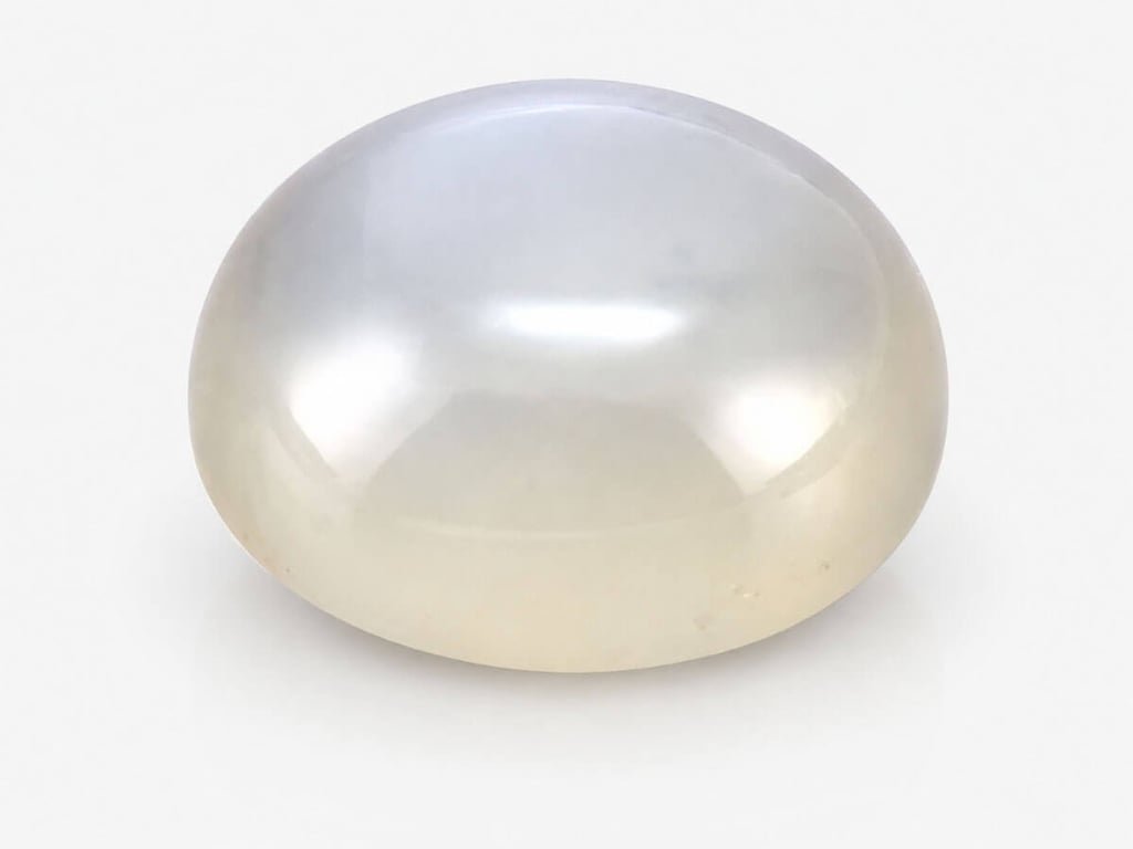 Moonstone with blue sheen and adularescence for Moon substitute.