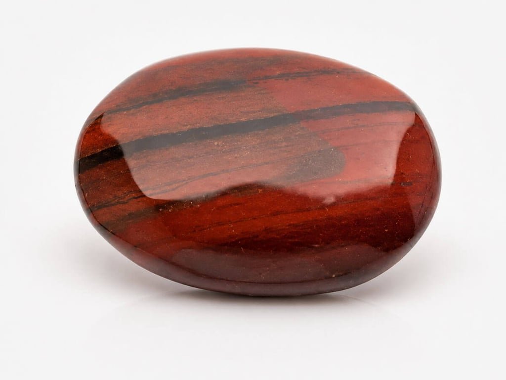 Earthy Red Jasper stone with natural grounding red tones.