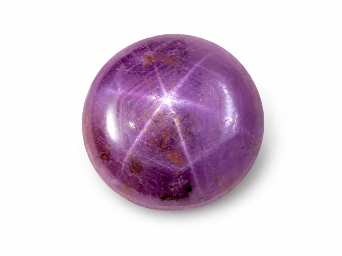 Rare Star Ruby gemstone showing natural asterism six-ray star.