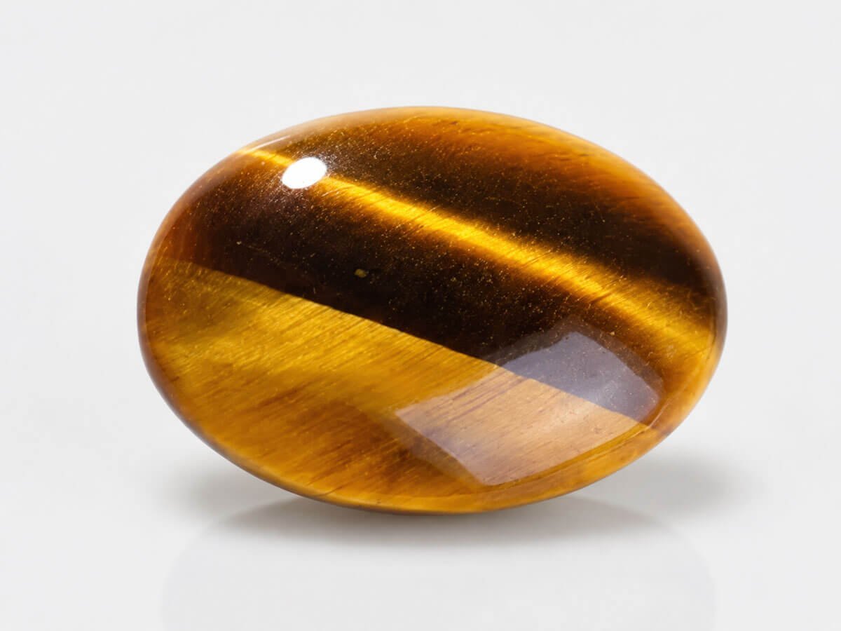 Golden-brown Tiger's Eye stone for bracelets, decor, and personal use.