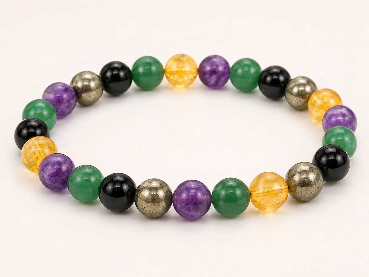 Custom gemstone bracelet with 24 approximately 8mm beads in a five-stone example design
