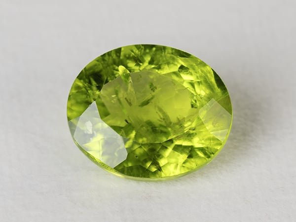Natural Peridot Stone (Pakistan Sapat Valley) 7.48 Carat (8.22 Ratti) Oval Mix Cut - View #1