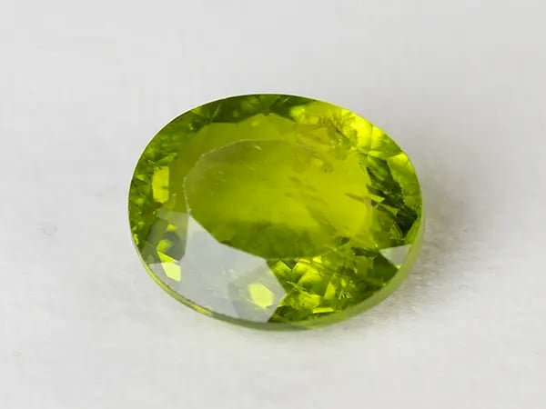 Natural Peridot Stone (Pakistan Sapat Valley) 9.26 Carat (10.18 Ratti) Oval Mix Cut - View #1