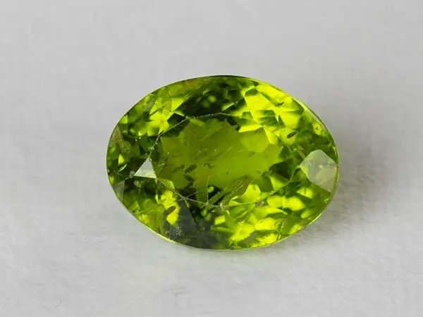 Natural Peridot Stone (Pakistan Sapat Valley) 9.98 Carat (10.97 Ratti) Oval Mix Cut - View #1