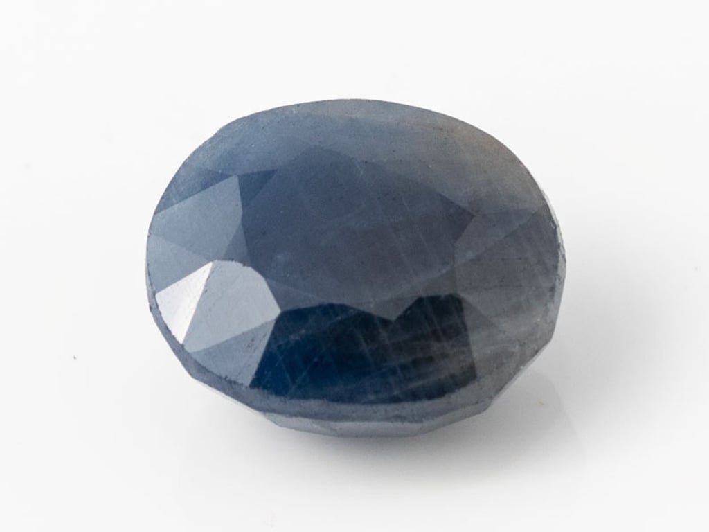 African Blue Sapphire Neelam 13.65 Carat top view, deep blue oval mix cut