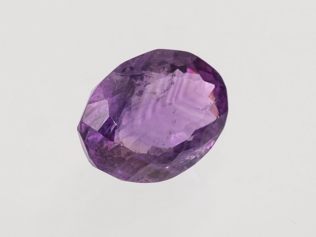 Natural Amethyst (Jamunia) 4.58 carat, top face-up view showing purple color and oval shape
