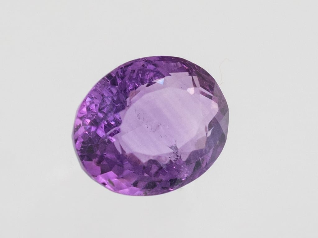 Natural Amethyst (Jamunia) 5.30 carat, top face-up view showing purple color and oval shape