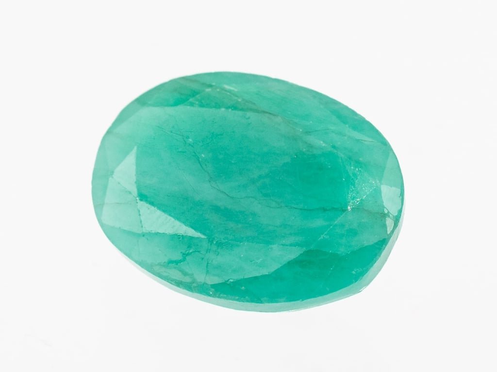 Brazilian (Sapota) Emerald (Panna) 7.04 Carat (7.74 Ratti) Oval Mixed Cut