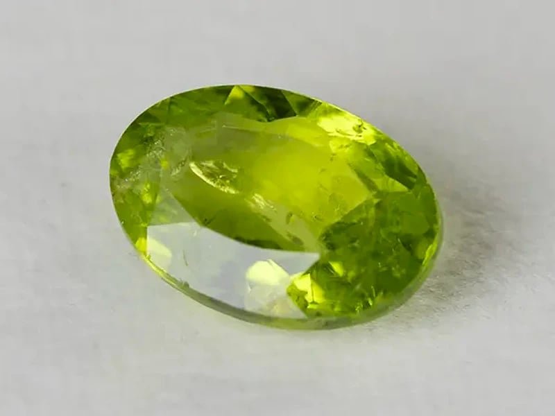 Natural Peridot Stone (Pakistan Sapat Valley) 5.94 Carat (6.53 Ratti) Oval Mix Cut