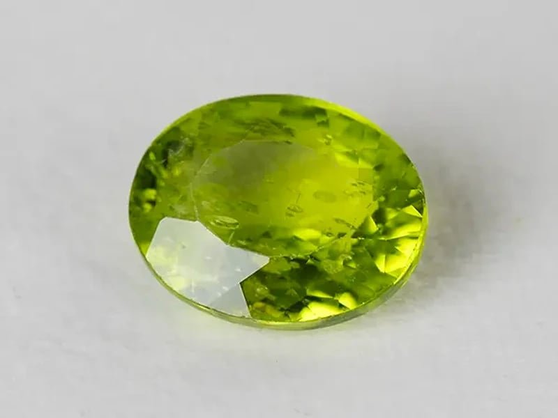 Natural Peridot Stone (Pakistan Sapat Valley) 7.02 Carat (7.71 Ratti) Oval Mix Cut - View #1