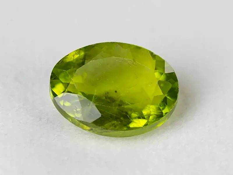 Natural Peridot Stone (Pakistan Sapat Valley) 7.60 Carat (8.35 Ratti) Oval Mix Cut - View #1