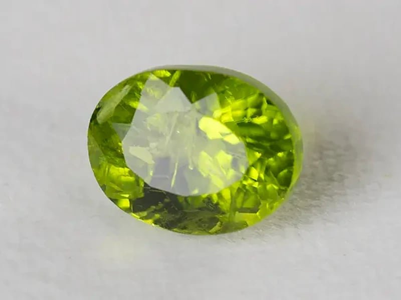 Natural Peridot Stone (Pakistan Sapat Valley) 7.78 Carat (8.55 Ratti) Oval Mix Cut