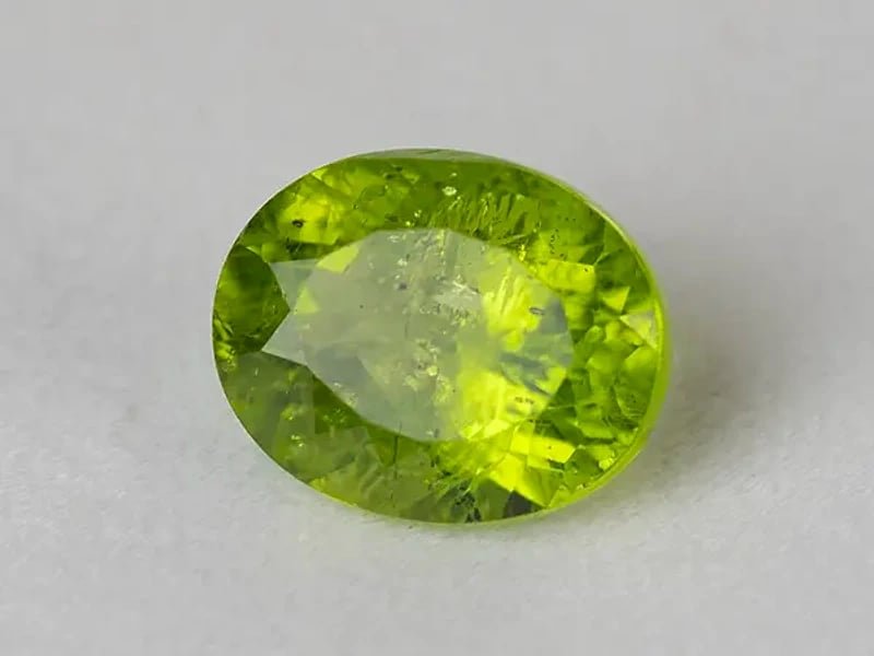Natural Peridot Stone (Pakistan Sapat Valley) 9.27 Carat (10.19 Ratti) Oval Mix Cut