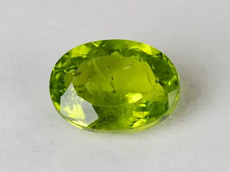 Natural Peridot Stone (Pakistan Sapat Valley) 9.28 Carat (10.20 Ratti) Oval Mix Cut - View #1