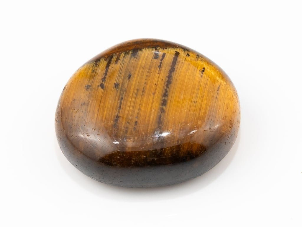 Tiger Eye Stone (Chitti) 9.08 carat, top view, golden brown oval cabochon with its band of light