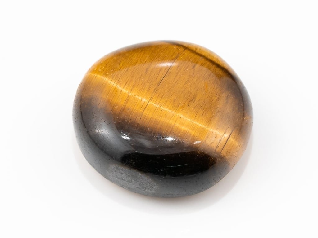 Tiger Eye Stone (Chitti) 9.24 carat, top view, golden brown oval cabochon with its band of light