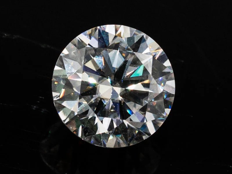 Lab-Grown Moissanite 3.55 Carat (10.00 mm) D colour VVS1 round brilliant cut displaying intense fire and scintillation