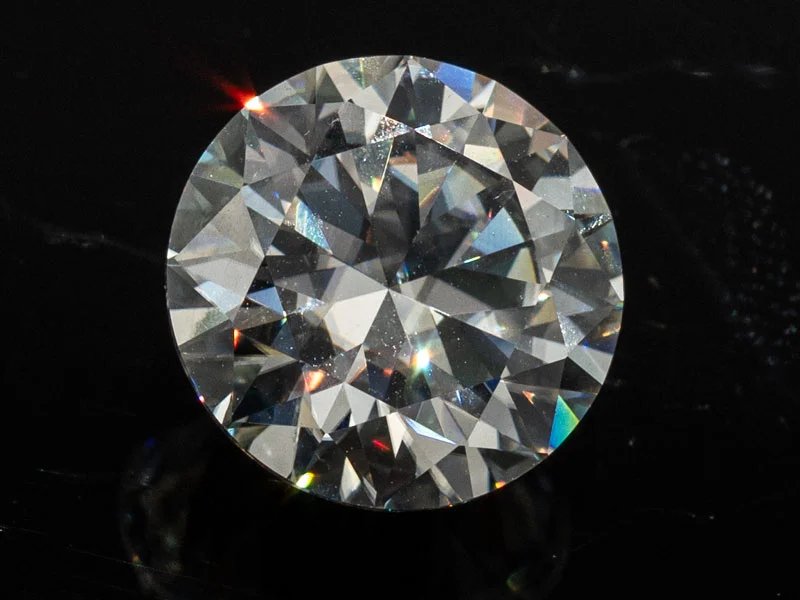 Lab-Grown Moissanite 4.46 Carat (11.00 mm) D colour FL round brilliant cut displaying intense fire and scintillation