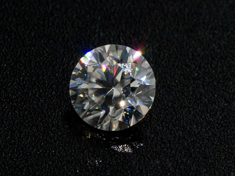 Lab-Grown Moissanite 0.70 Carat (6.00 mm) D colour VVS1 round brilliant cut displaying intense fire and scintillation