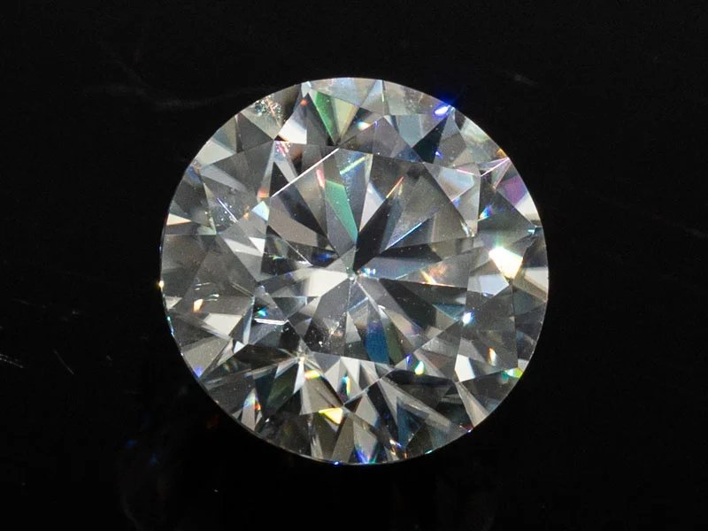 Lab-Grown Moissanite 3.00 Carat (9.50 mm) D colour VVS1 round brilliant cut displaying intense fire and scintillation