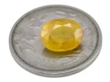 Reference size view of Yellow Sapphire (Pukhraj) 5.025 Carat (5.52 Ratti) - Bangkok