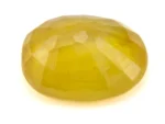 Back view of Yellow Sapphire (Pukhraj) 5.620 Carat (6.19 Ratti) - Bangkok