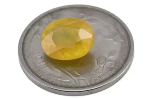 Reference size view of Yellow Sapphire (Pukhraj) 5.620 Carat (6.19 Ratti) - Bangkok