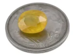 Reference size view of Yellow Sapphire (Pukhraj) 5.620 Carat (6.19 Ratti) - Bangkok