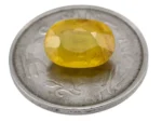 Reference size view of Yellow Sapphire (Pukhraj) 6.500 Carat (7.13 Ratti) - Bangkok