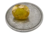 Reference size view of Yellow Sapphire (Pukhraj) 6.800 Carat (7.48 Ratti) - Bangkok