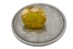 Reference size view of Yellow Sapphire (Pukhraj) 6.800 Carat (7.48 Ratti) - Bangkok
