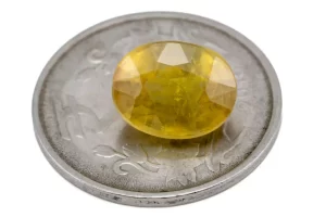 Reference size view of Yellow Sapphire (Pukhraj) 7.635 Carat (8.33 Ratti) - Bangkok