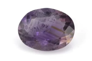 High-resolution image of the Original Amethyst Stone 5.27 Carat (5.79 Ratti) Jamunia showcasing its vibrant blue-purple hues and flawless oval cut.