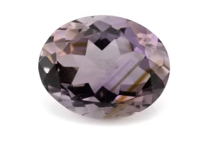 High-resolution image of the Original Amethyst Stone 5.59 Carat (6.14 Ratti) Jamunia showcasing its vibrant blue-purple hues and flawless oval cut.