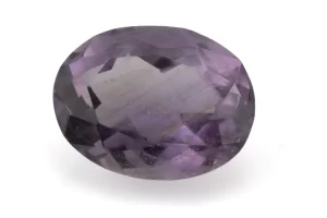 High-resolution image of the Original Amethyst Stone 5.82 Carat (6.40 Ratti) Jamunia showcasing its vibrant blue-purple hues and flawless oval cut.