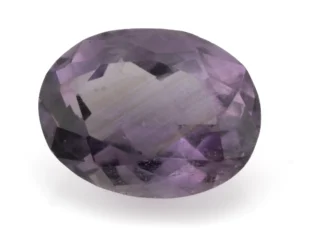 High-resolution image of the Original Amethyst Stone 5.82 Carat (6.40 Ratti) Jamunia showcasing its vibrant blue-purple hues and flawless oval cut.