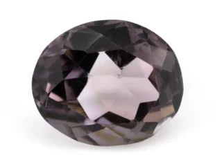High-resolution image of the Original Amethyst Stone 6.02 Carat (6.61 Ratti) Jamunia showcasing its vibrant blue-purple hues and flawless oval cut.