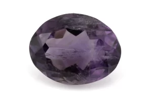 High-resolution image of the Original Amethyst Stone 6.19 Carat (6.80 Ratti) Jamunia showcasing its vibrant blue-purple hues and flawless oval cut.