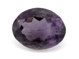 High-resolution image of the Original Amethyst Stone 6.19 Carat (6.80 Ratti) Jamunia showcasing its vibrant blue-purple hues and flawless oval cut.