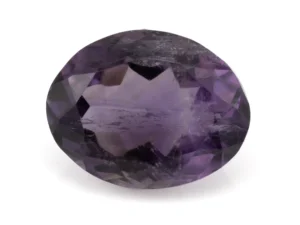 High-resolution image of the Original Amethyst Stone 6.19 Carat (6.80 Ratti) Jamunia showcasing its vibrant blue-purple hues and flawless oval cut.
