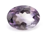 High-resolution image of the Original Amethyst Stone 6.42 Carat (7.05 Ratti) Jamunia showcasing its vibrant blue-purple hues and flawless oval cut.