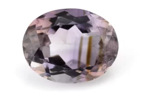 High-resolution image of the Original Amethyst Stone 6.520 Carat (7.16 Ratti) Jamunia showcasing its vibrant blue-purple hues and flawless oval cut.