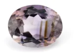 High-resolution image of the Original Amethyst Stone 6.520 Carat (7.16 Ratti) Jamunia showcasing its vibrant blue-purple hues and flawless oval cut.