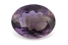 High-resolution image of the Original Amethyst Stone 6.70 Carat (7.36 Ratti) Jamunia showcasing its vibrant blue-purple hues and flawless oval cut.